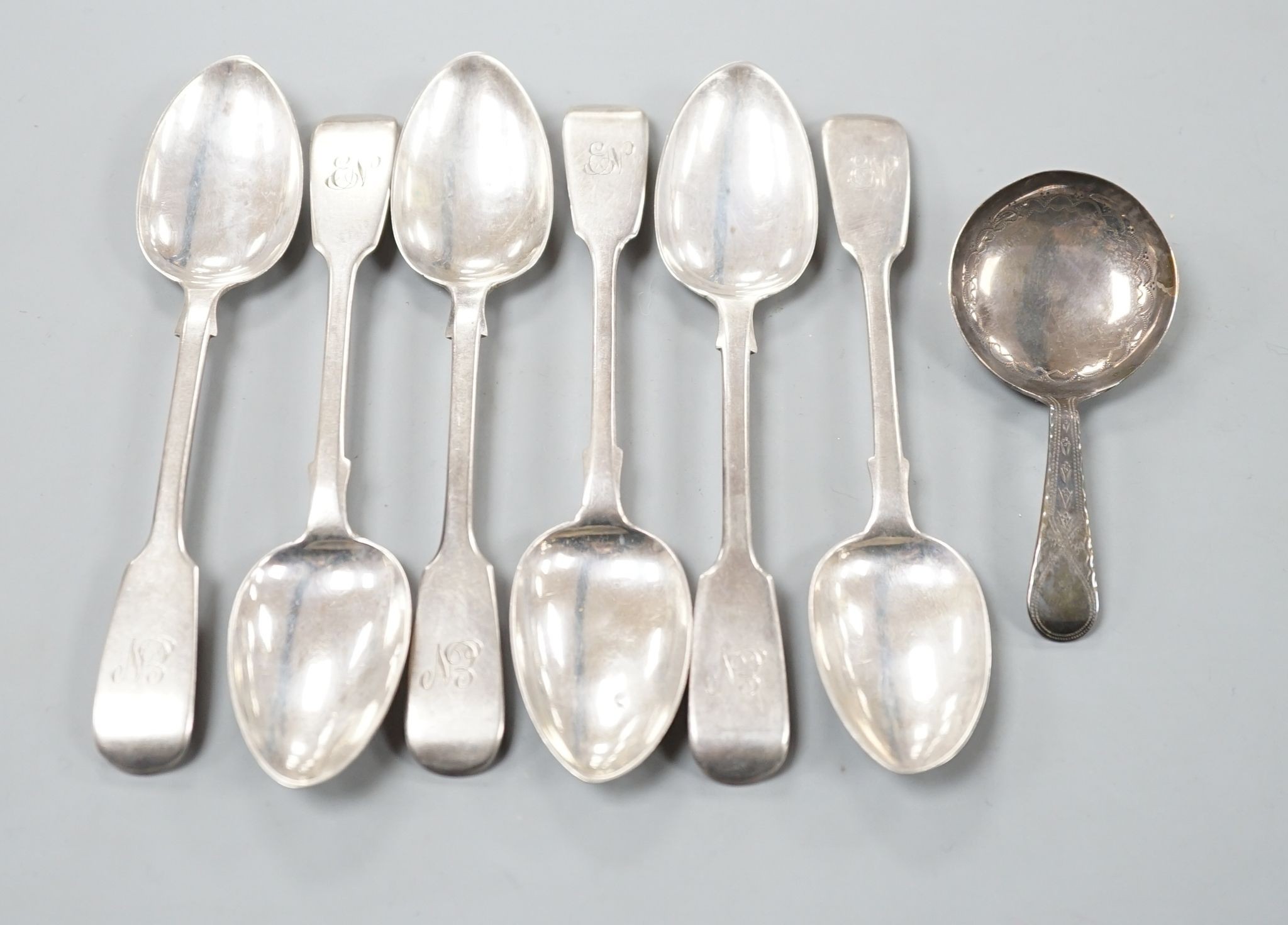 A set of six early Victorian silver fiddle pattern teaspoons, Charles Boyton, London, 1844 and a George IV silver caddy spoon, Birmingham, 1821, 3.5oz.